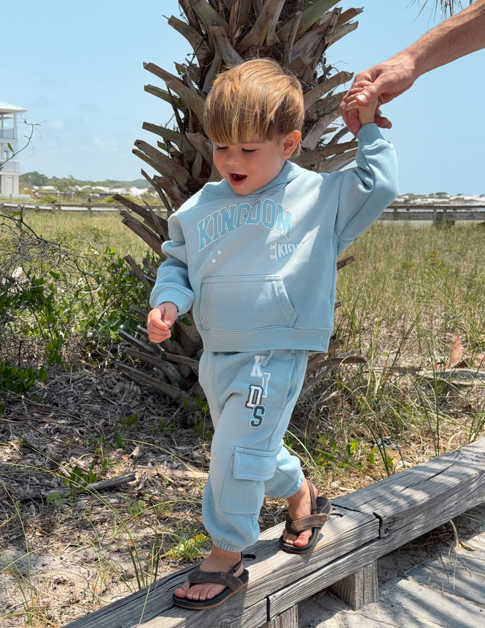 Kids light-blue cargo sweatpants with side pocket and elastic cuffs