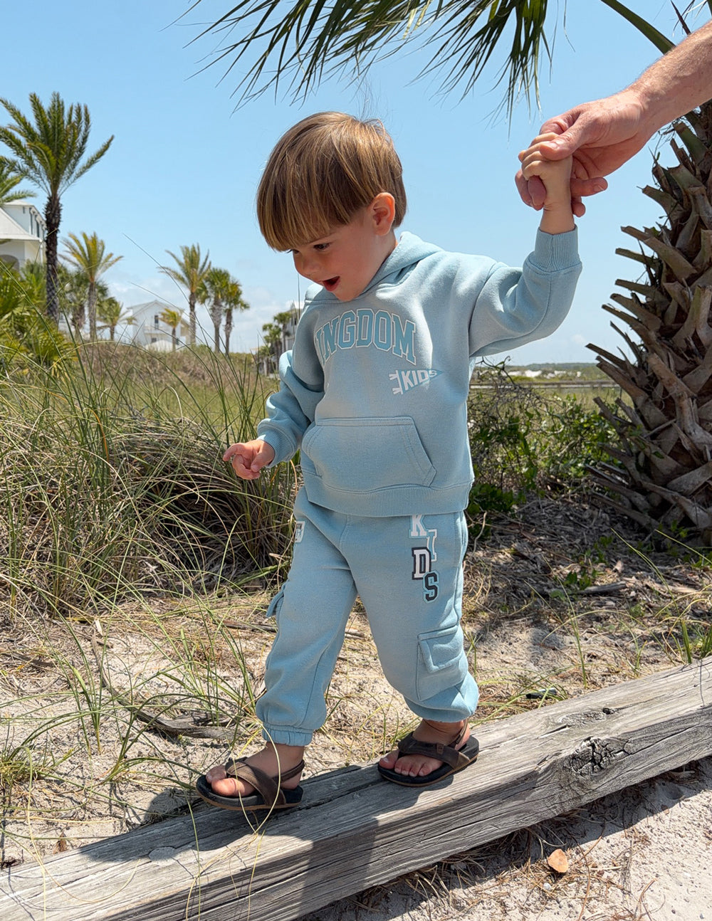 Kids light-blue cargo sweatpants with cargo pocket and graphic patch