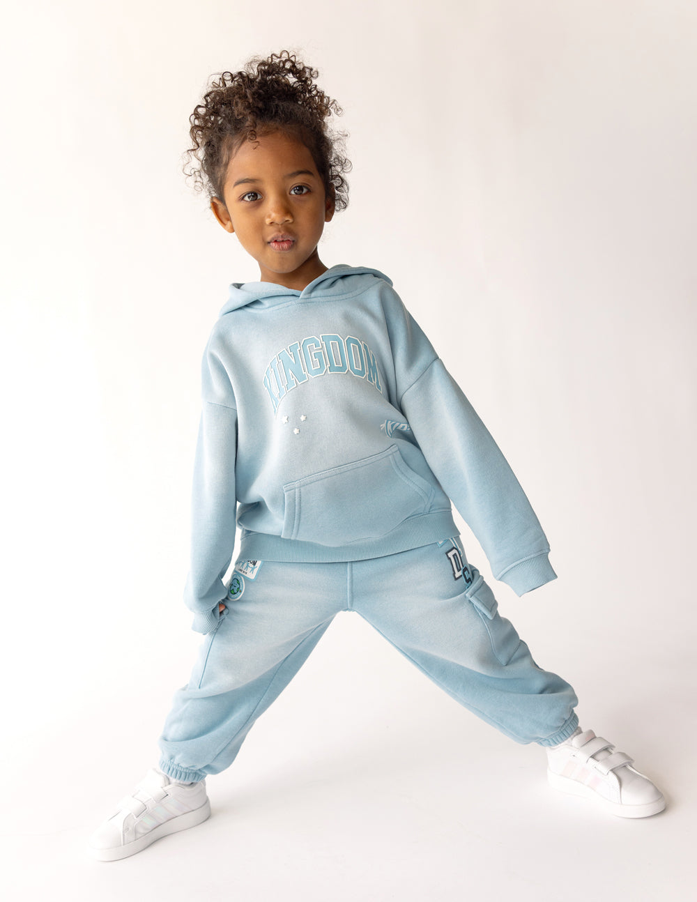 Kids light blue hoodie with hood and kangaroo pocket, Kingdom logo on front