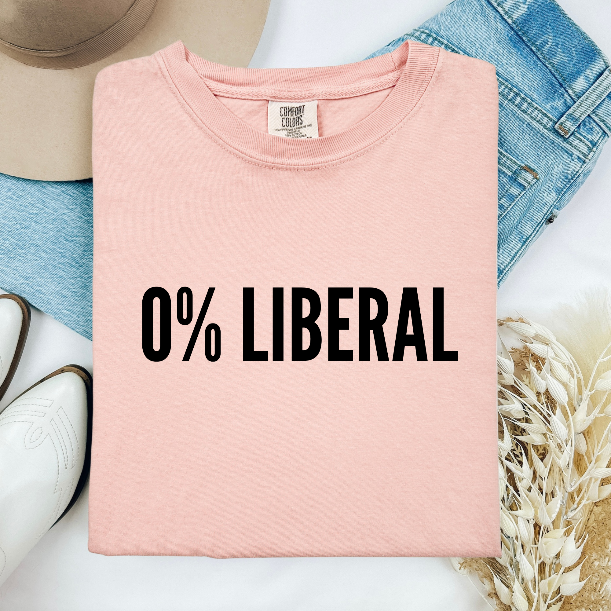 Pink cotton crew-neck T-shirt with '0% LIBERAL' print