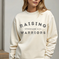 Off-white crewneck sweatshirt with Raising Warriors graphic print
