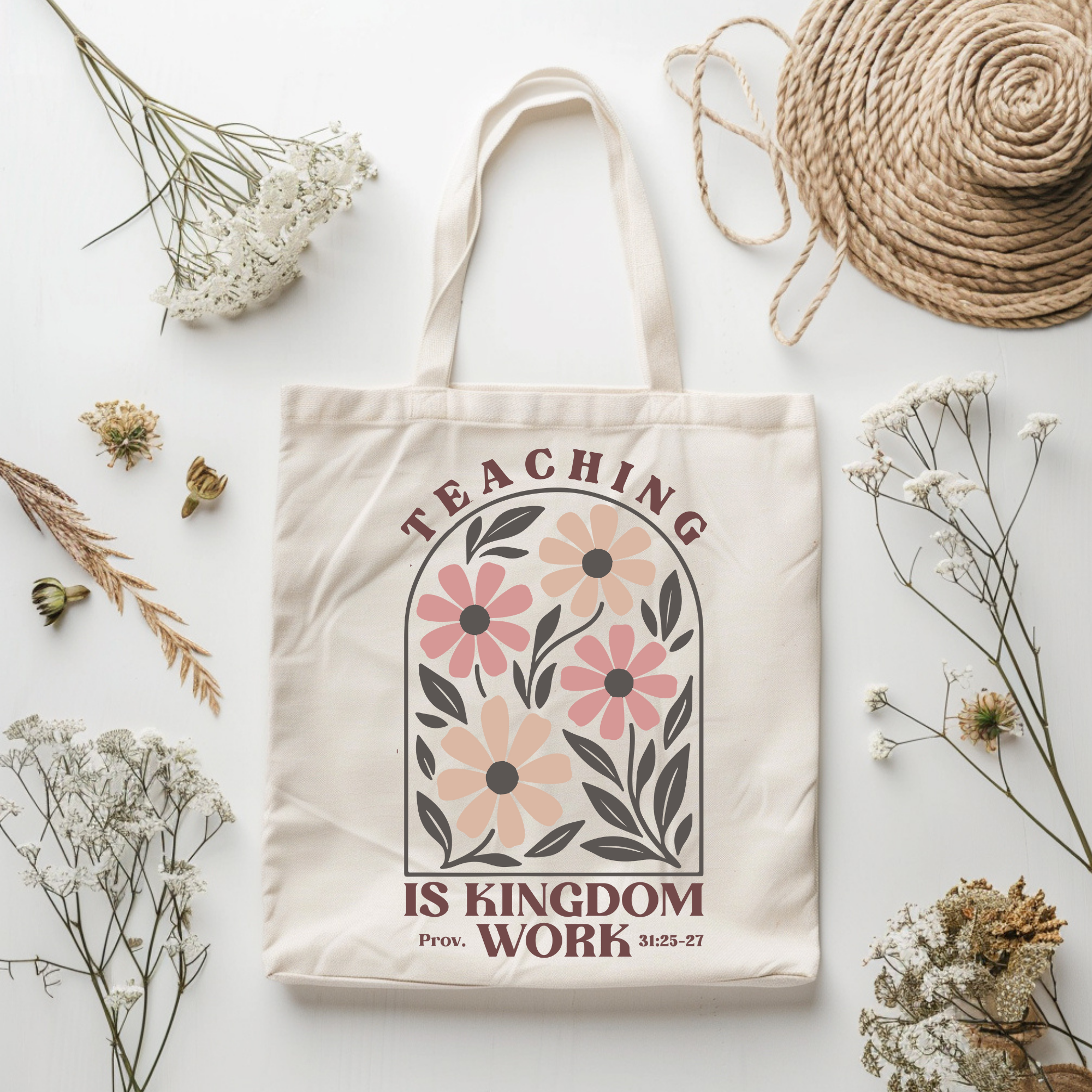 Cream canvas tote bag with floral print and text "Teaching is Kingdom Work"