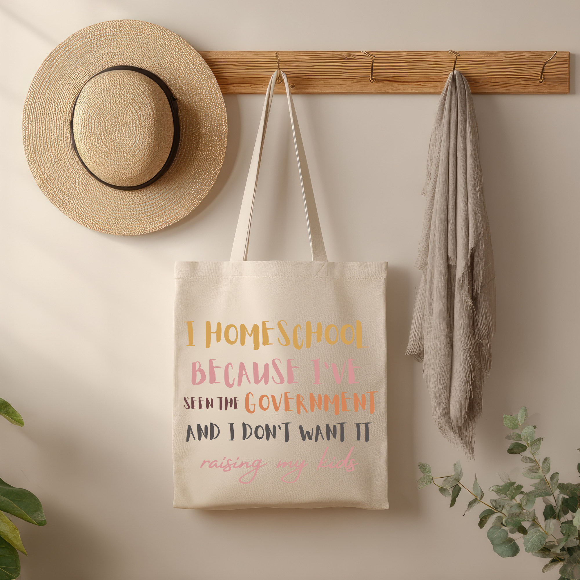 Canvas tote bag with multicolor 'Homeschool' slogan print and long handles