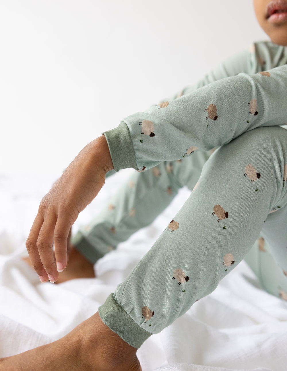 Kids pajama set in light sage with lamb print and cuffed pant ankles