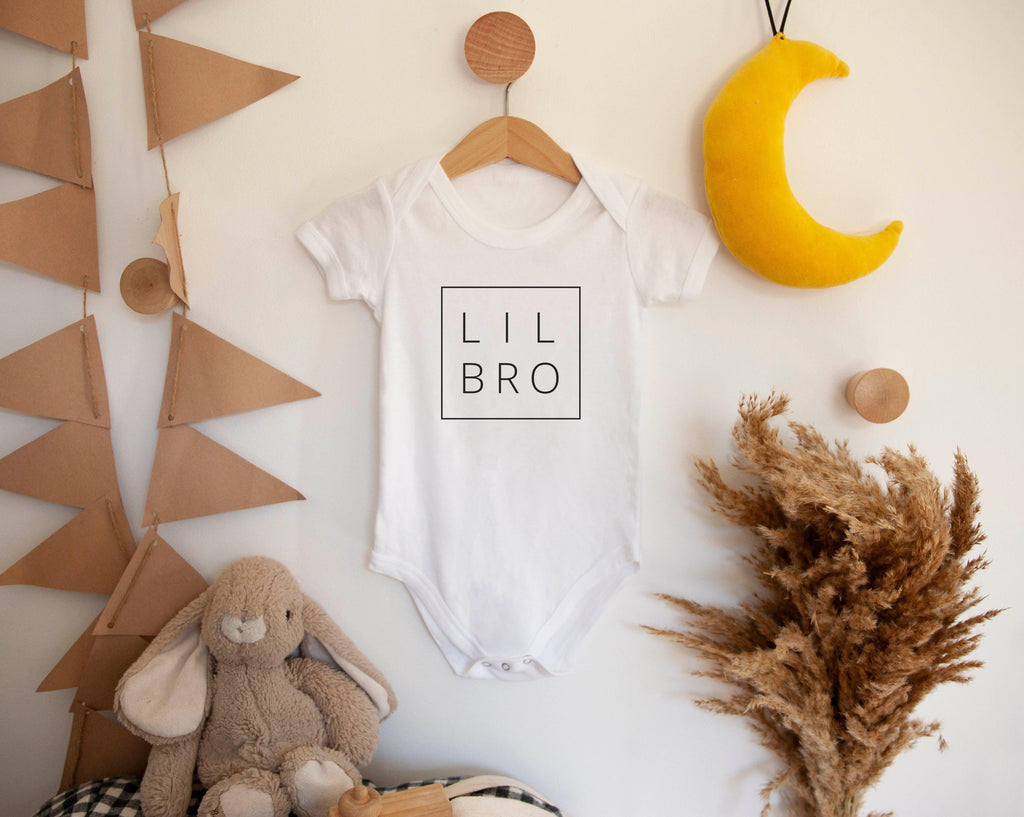 White baby bodysuit with centered LIL BRO logo print