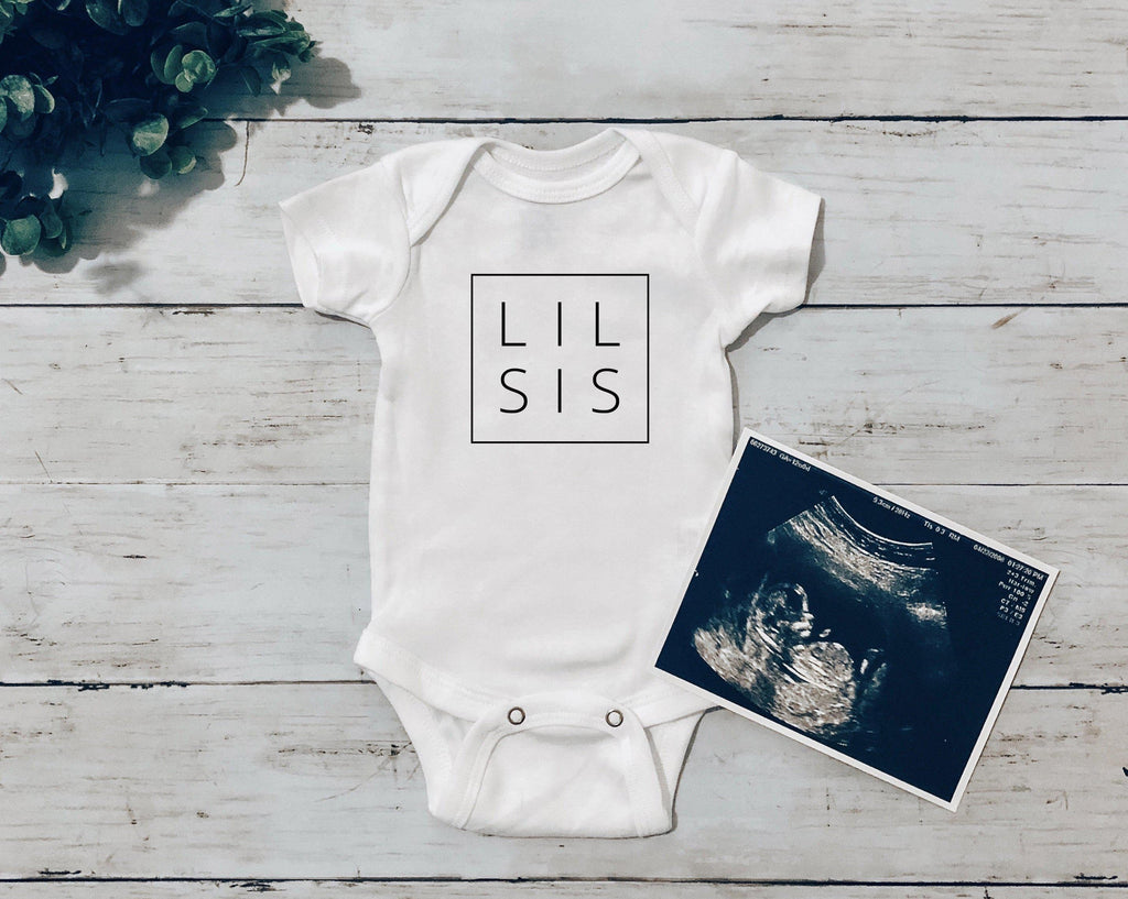 White baby bodysuit with LIL SIS square print