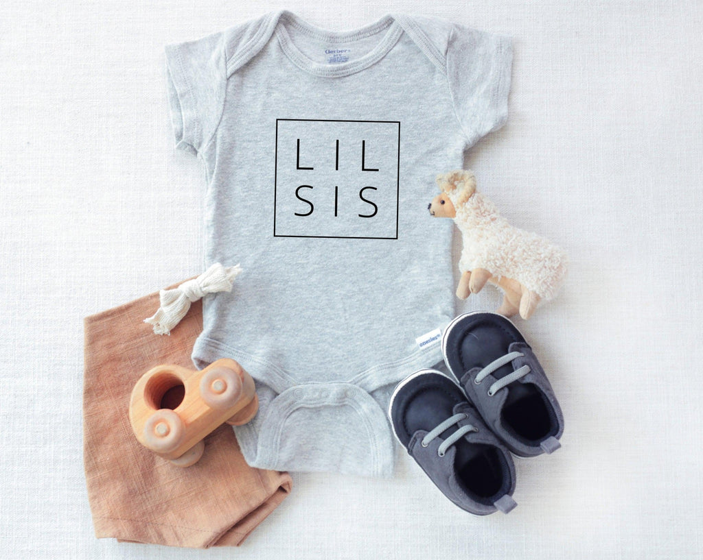 Heather grey baby bodysuit with LIL SIS square print and snaps