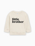 Natural cream baby pullover with long sleeves and 'little brother' text front