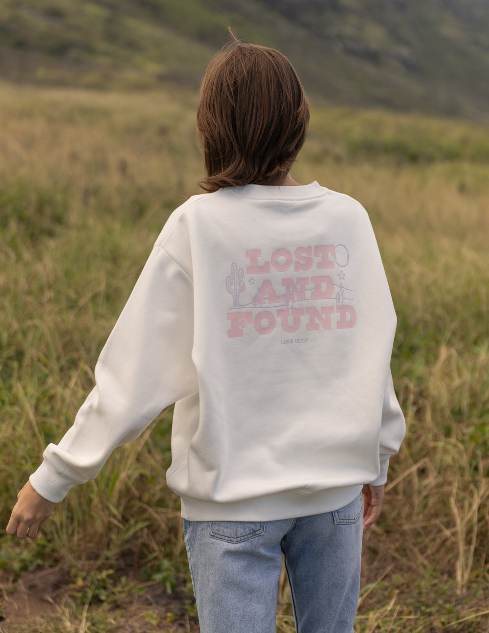 Unisex crewneck sweatshirt, light cream back graphic print and ribbed cuffs