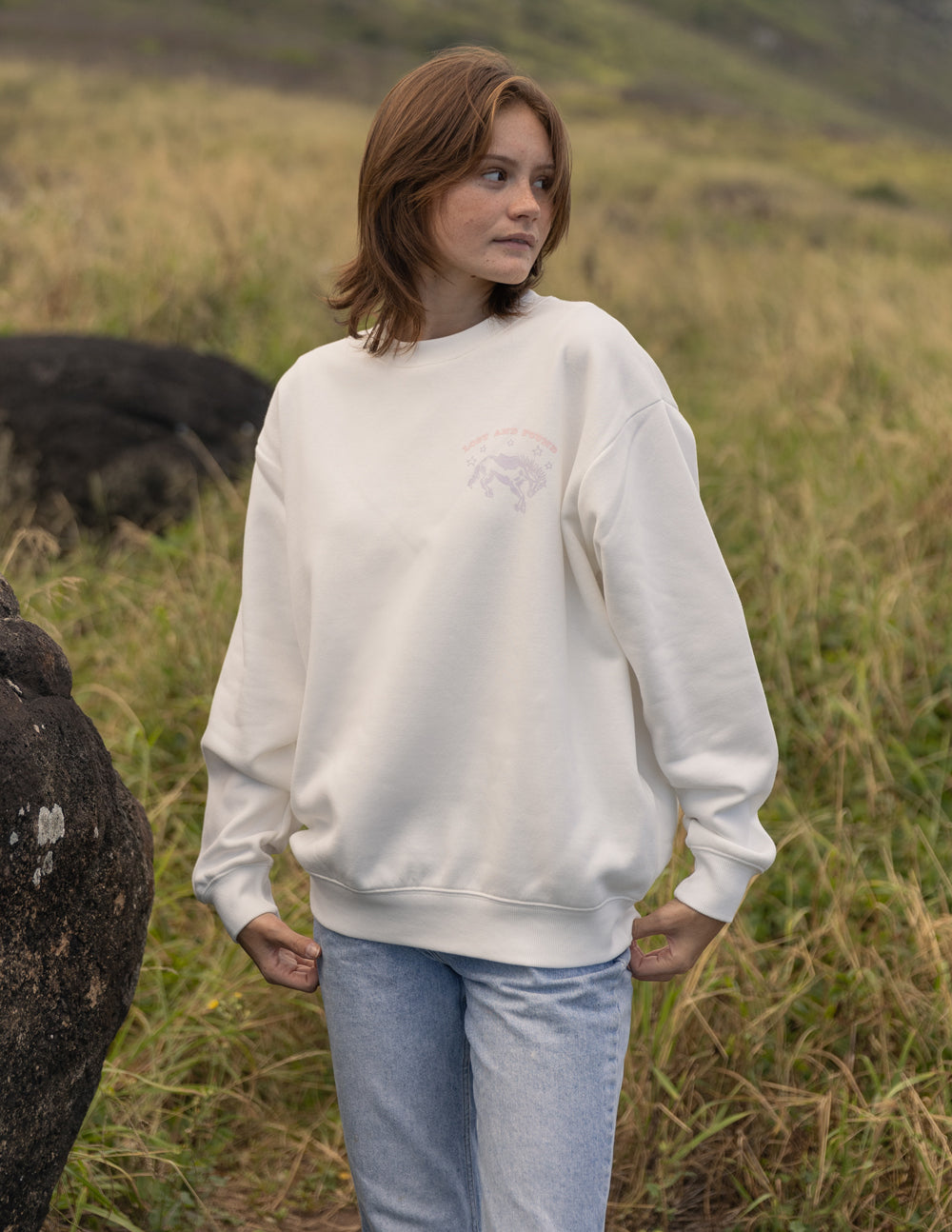 Unisex crewneck sweatshirt, light cream front logo and ribbed hem