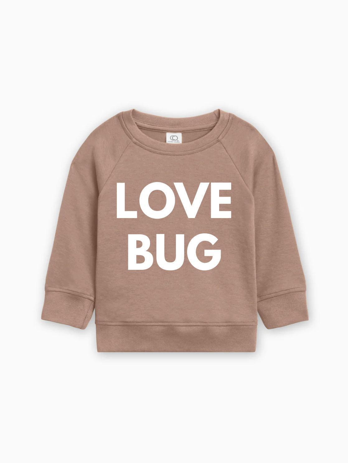 Brown baby pullover with white “LOVE BUG” text graphic
