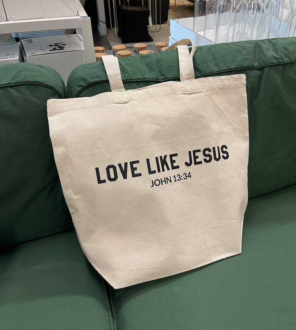 Natural canvas tote bag with front text LOVE LIKE JESUS, JOHN 13:34