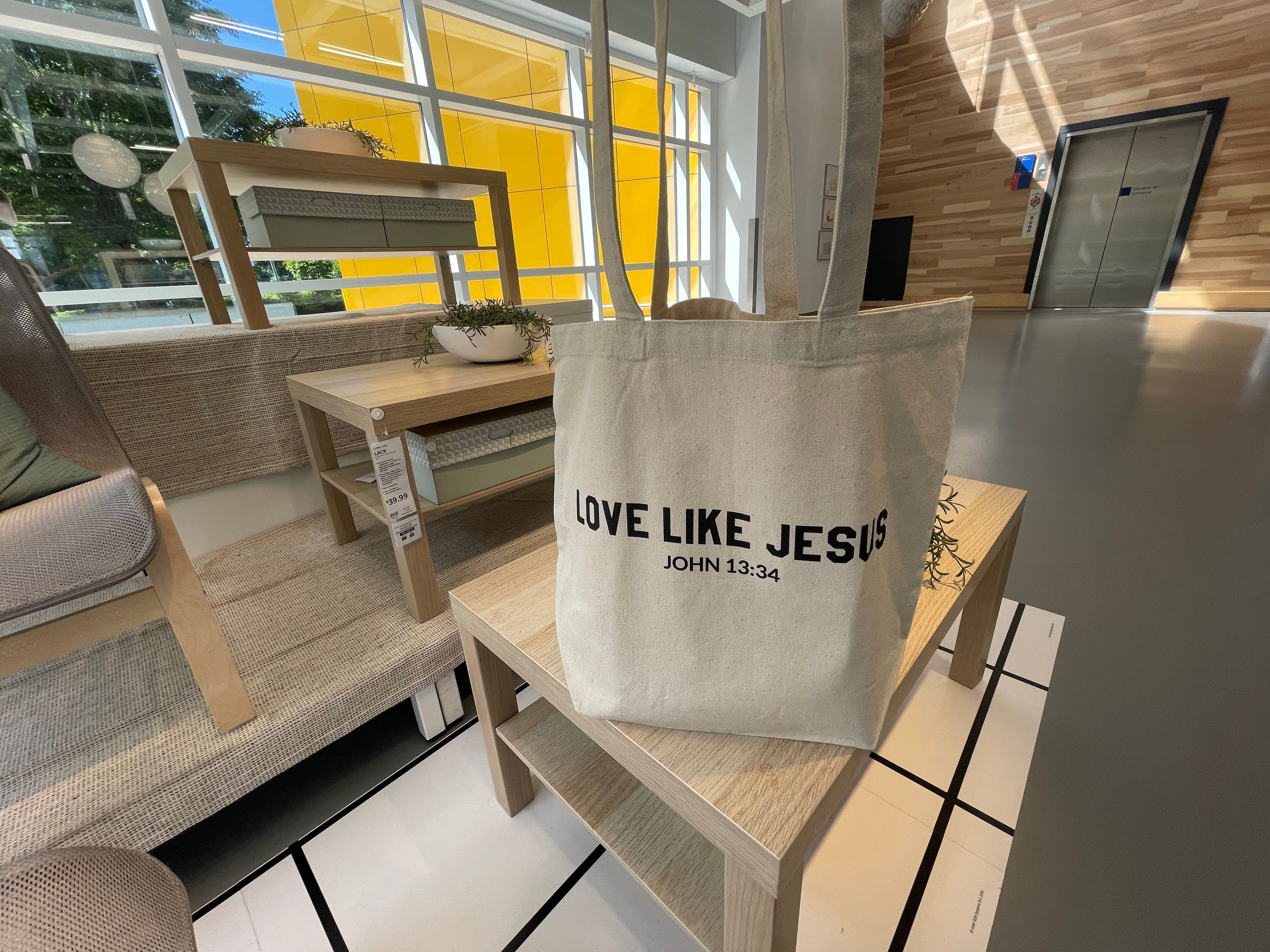 Natural canvas tote bag with LOVE LIKE JESUS and JOHN 13:34 lettering