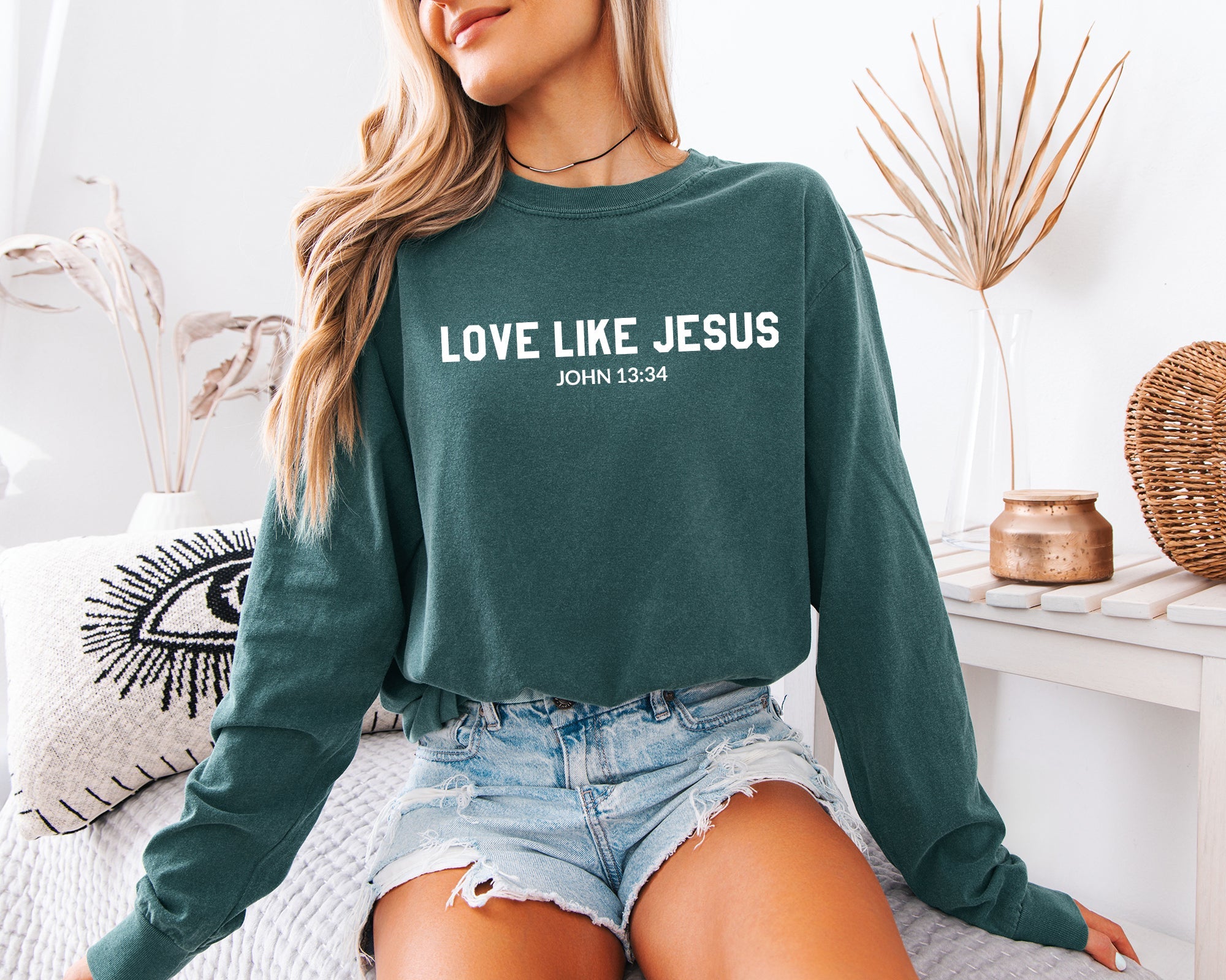 Long sleeve crewneck T-shirt in deep green with “LOVE LIKE JESUS” front print