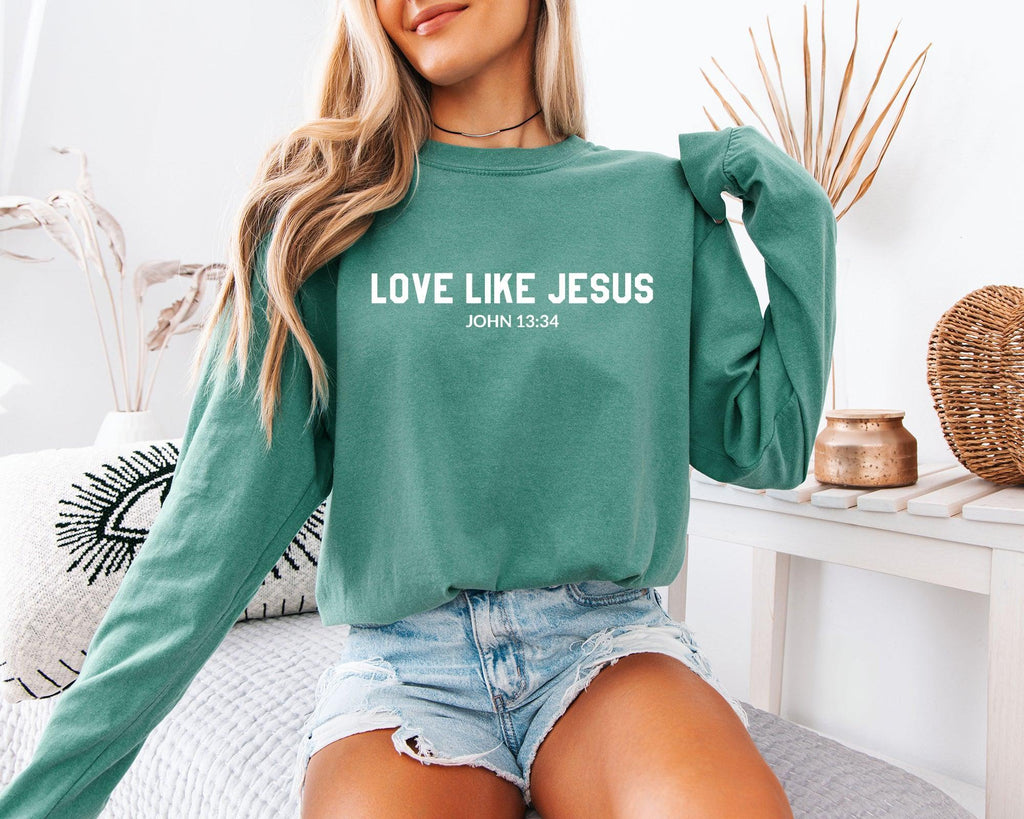 Long sleeve crewneck T-shirt in green with “LOVE LIKE JESUS” front print