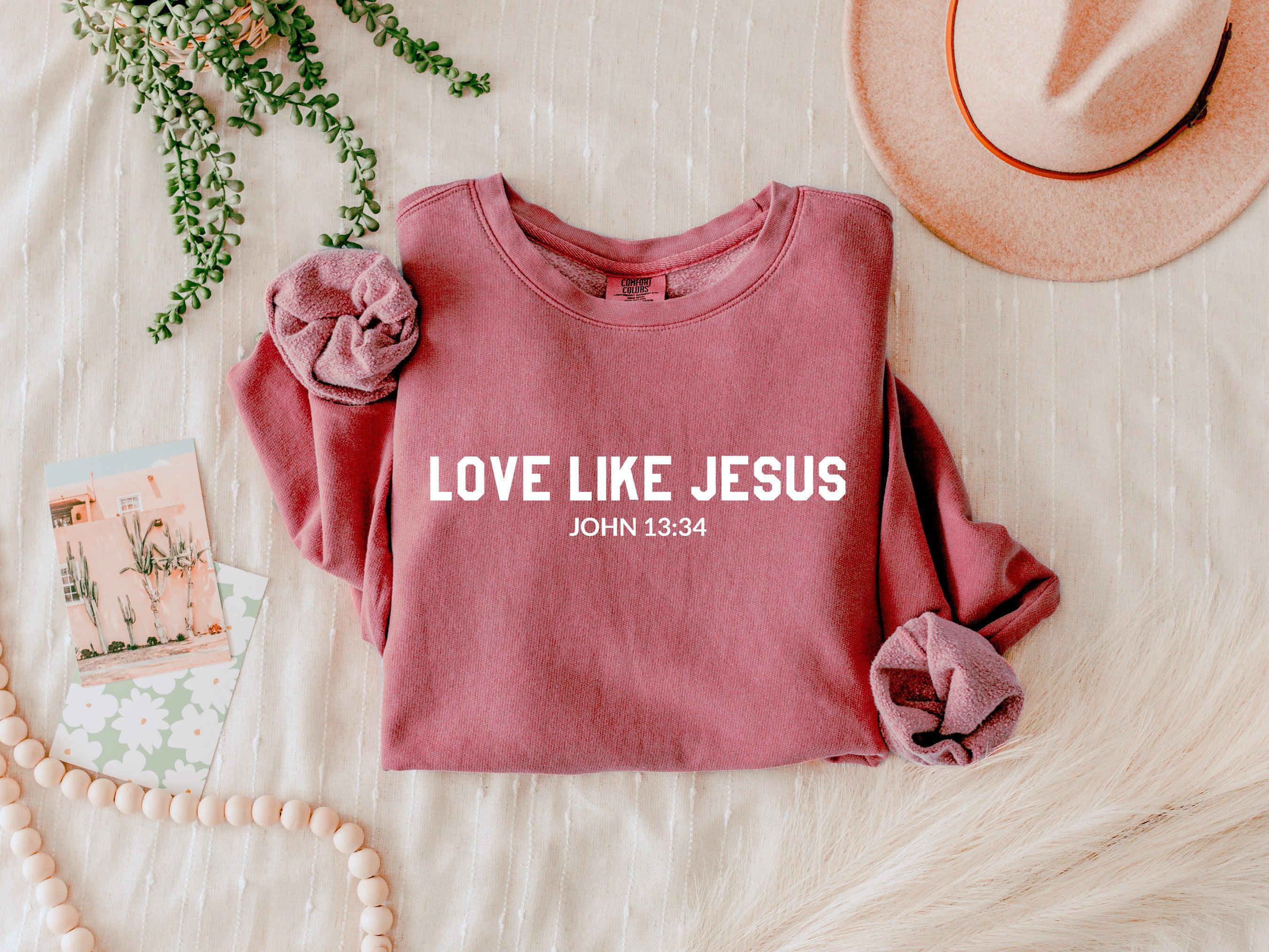 Dusty rose Christian sweatshirt with LOVE LIKE JESUS front print