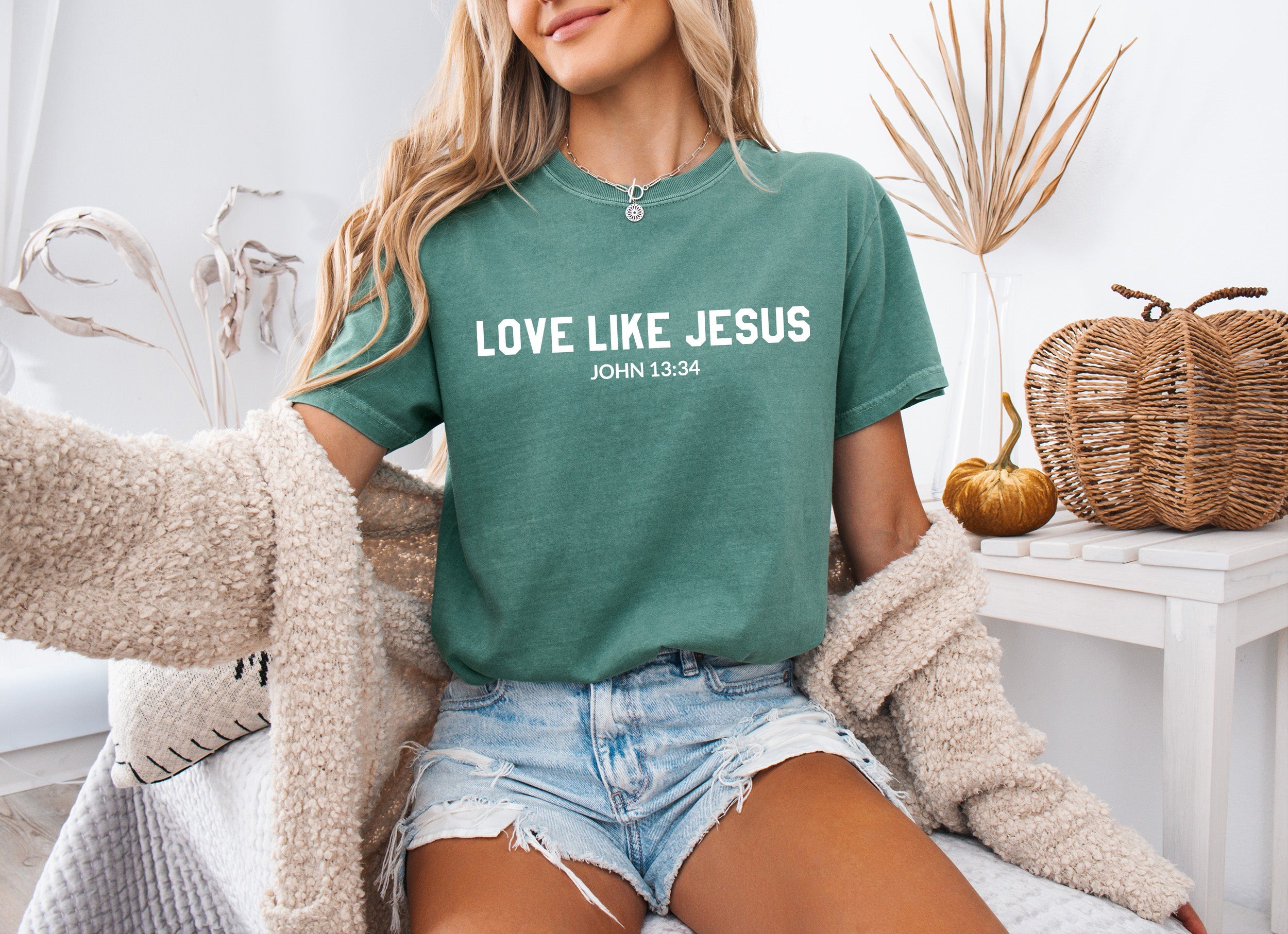 Green crew-neck Christian graphic T-shirt with “LOVE LIKE JESUS” text on chest