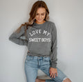 Grey long sleeve T-shirt with white “LOVE MY SWEET BOYS” print.