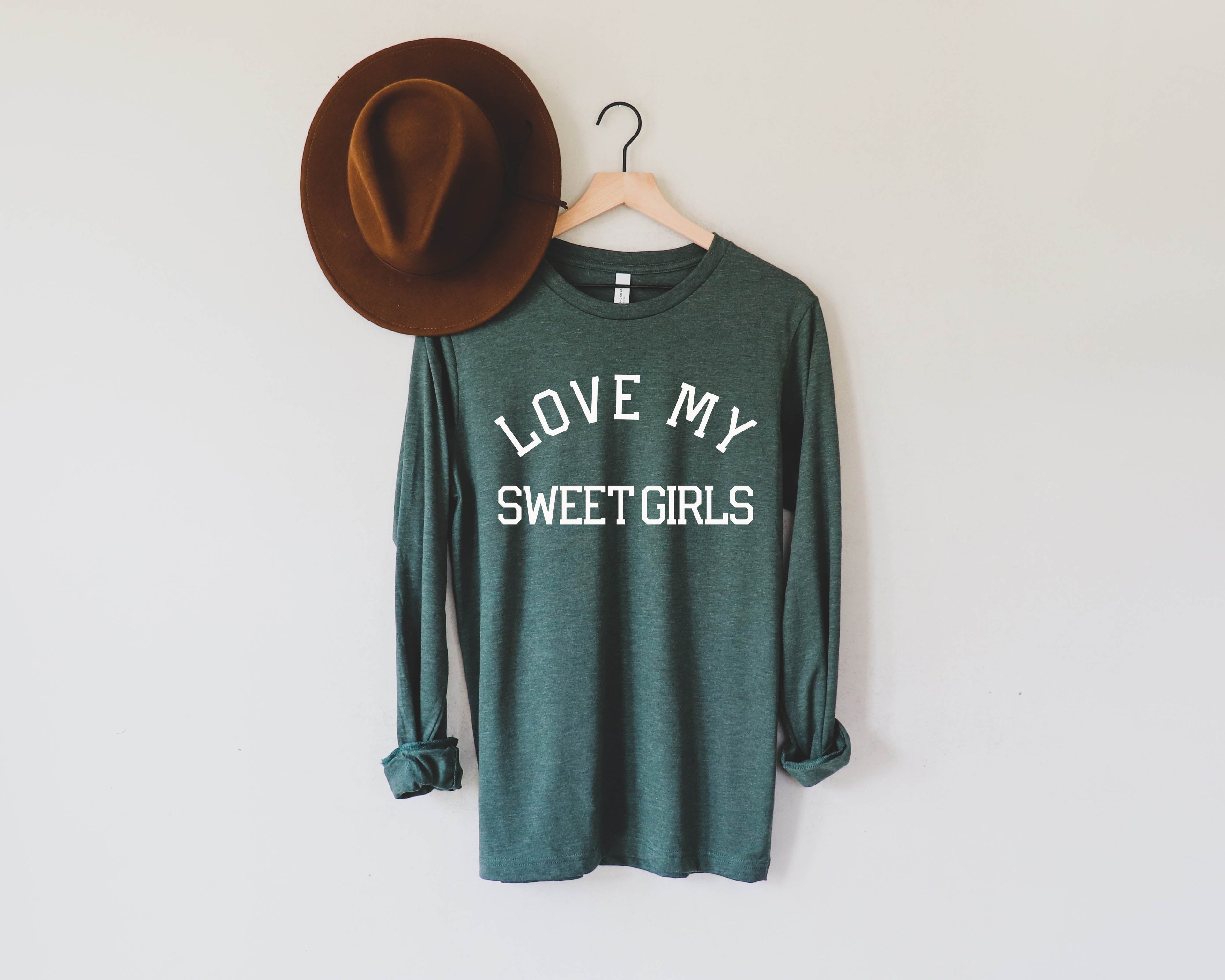 Dark green long sleeve T-shirt with 'LOVE MY SWEET GIRLS' front text
