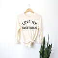 White long sleeve T-shirt with 'LOVE MY SWEET GIRLS' print and tied front hem