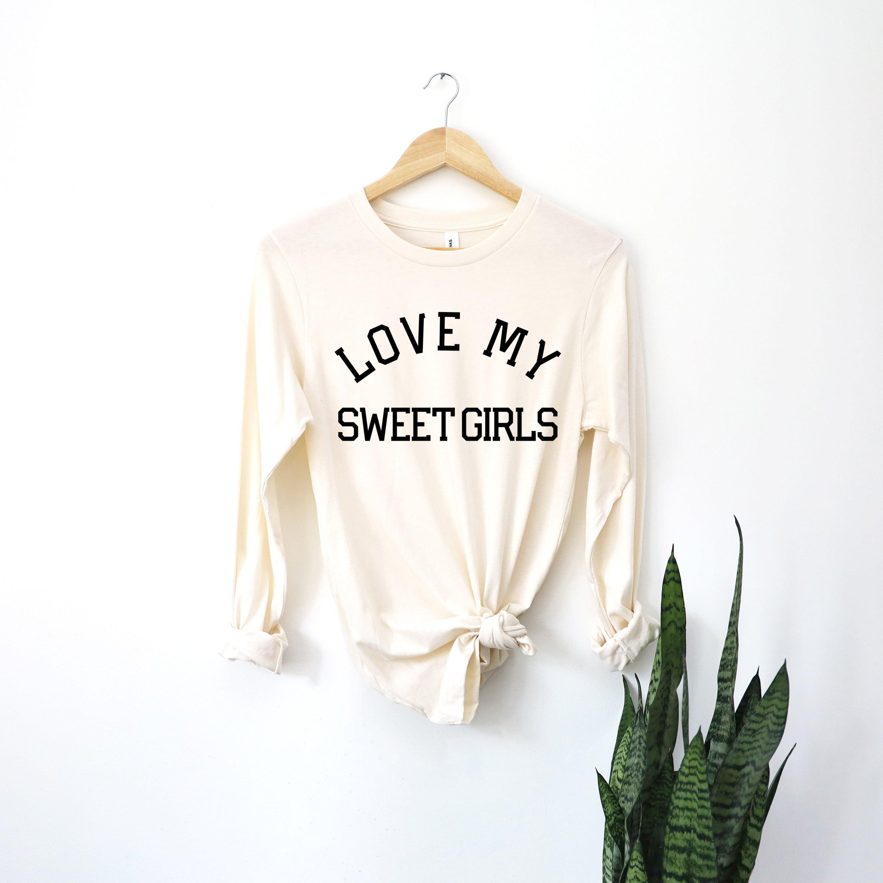 White long sleeve T-shirt with 'LOVE MY SWEET GIRLS' print and tied front hem