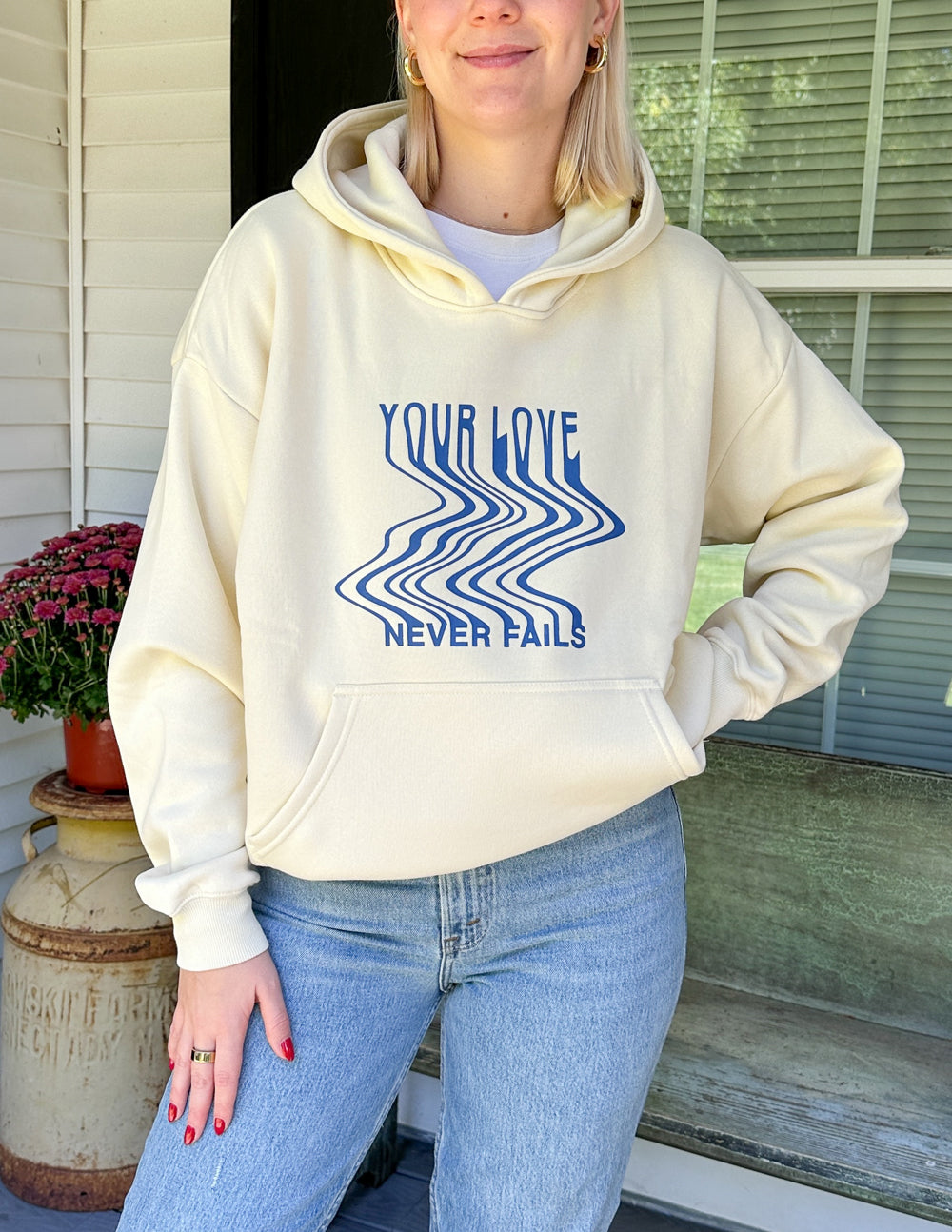 Cream unisex hoodie with blue 'Your Love' graphic, hood and front kangaroo pocket