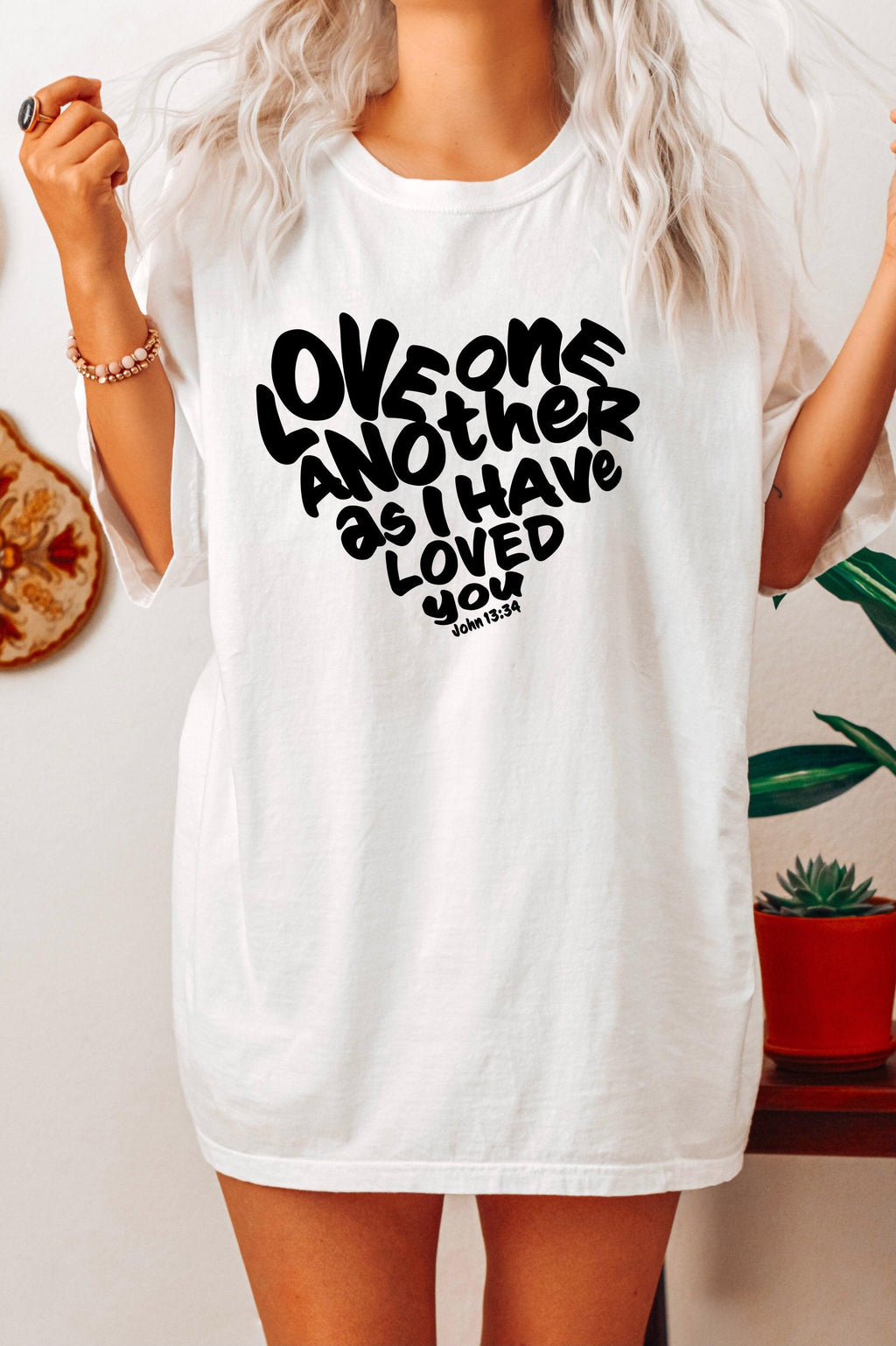 Unisex white crewneck T-shirt with black inspirational text graphic