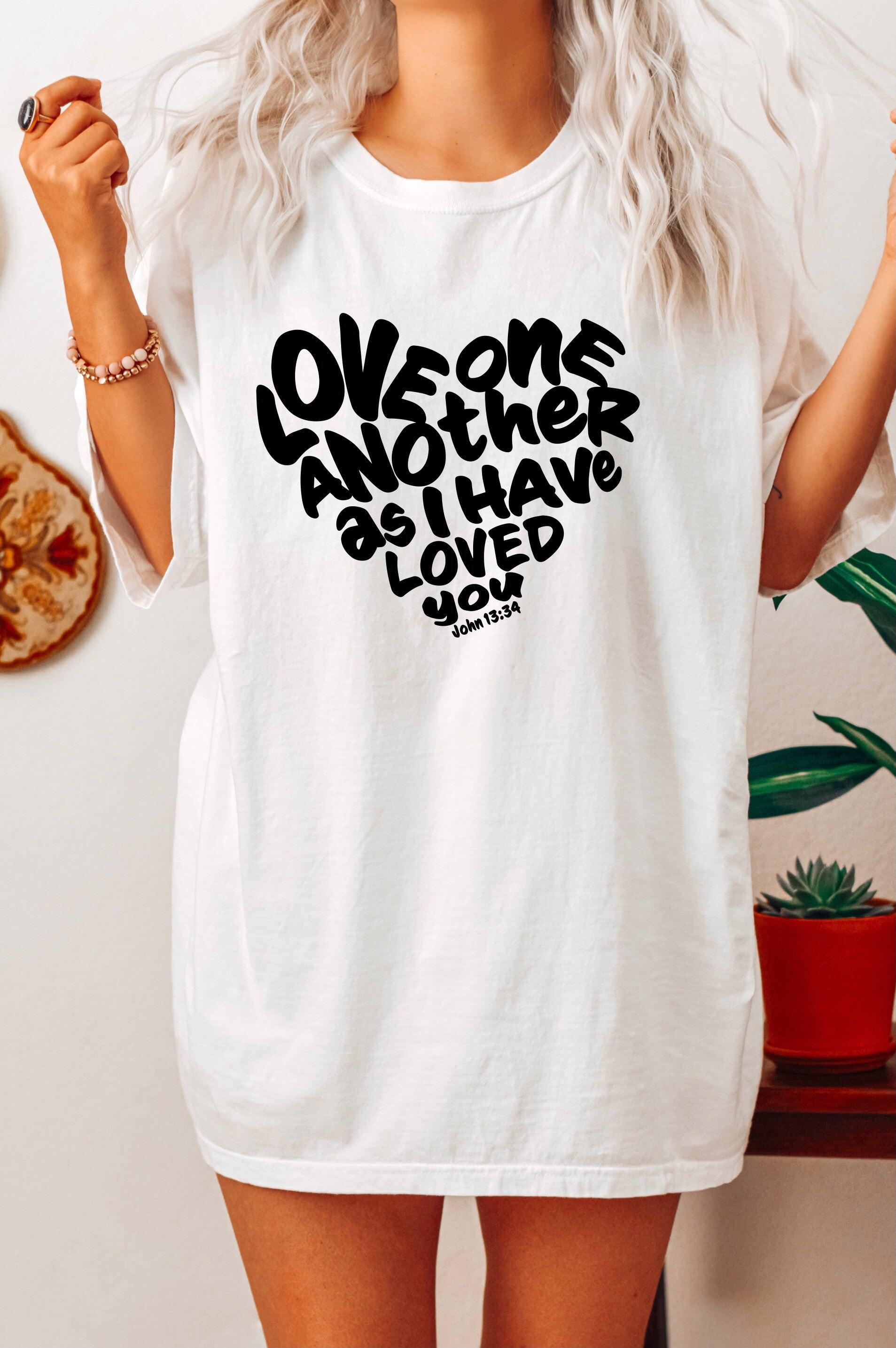 Unisex white crewneck T-shirt with black inspirational text graphic
