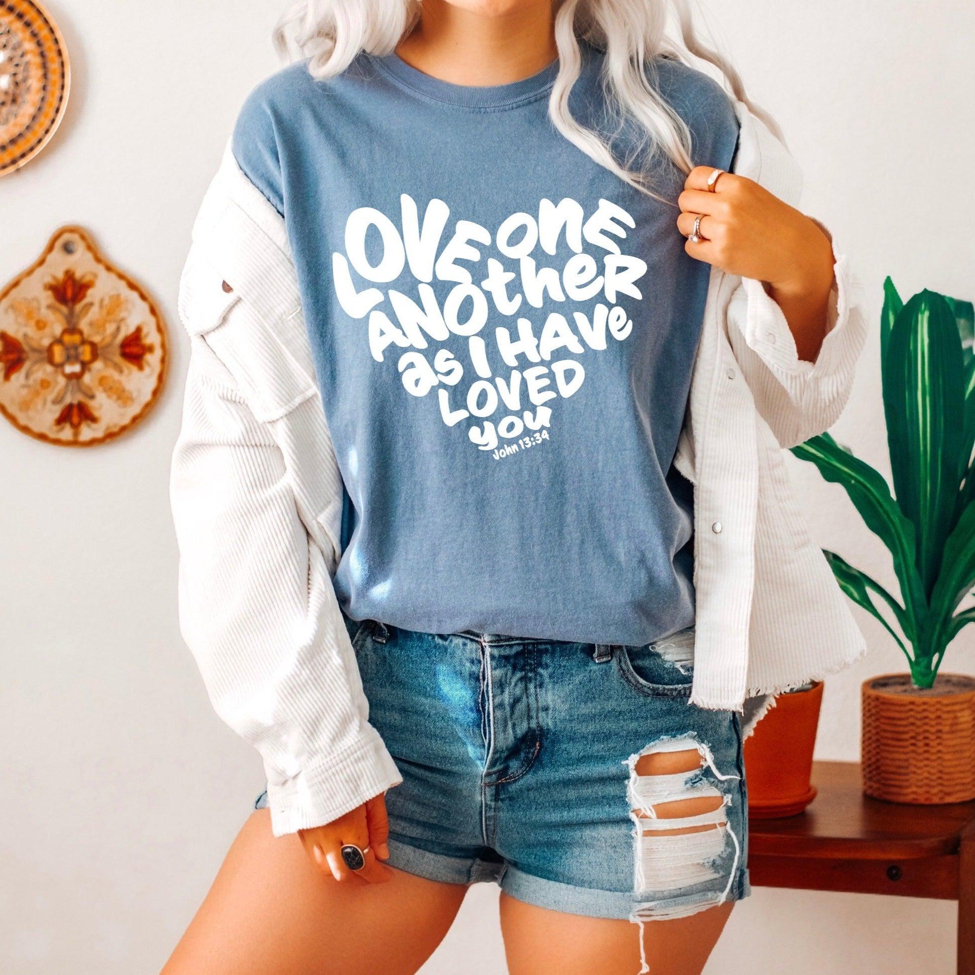 Unisex blue crewneck T-shirt with white inspirational text graphic