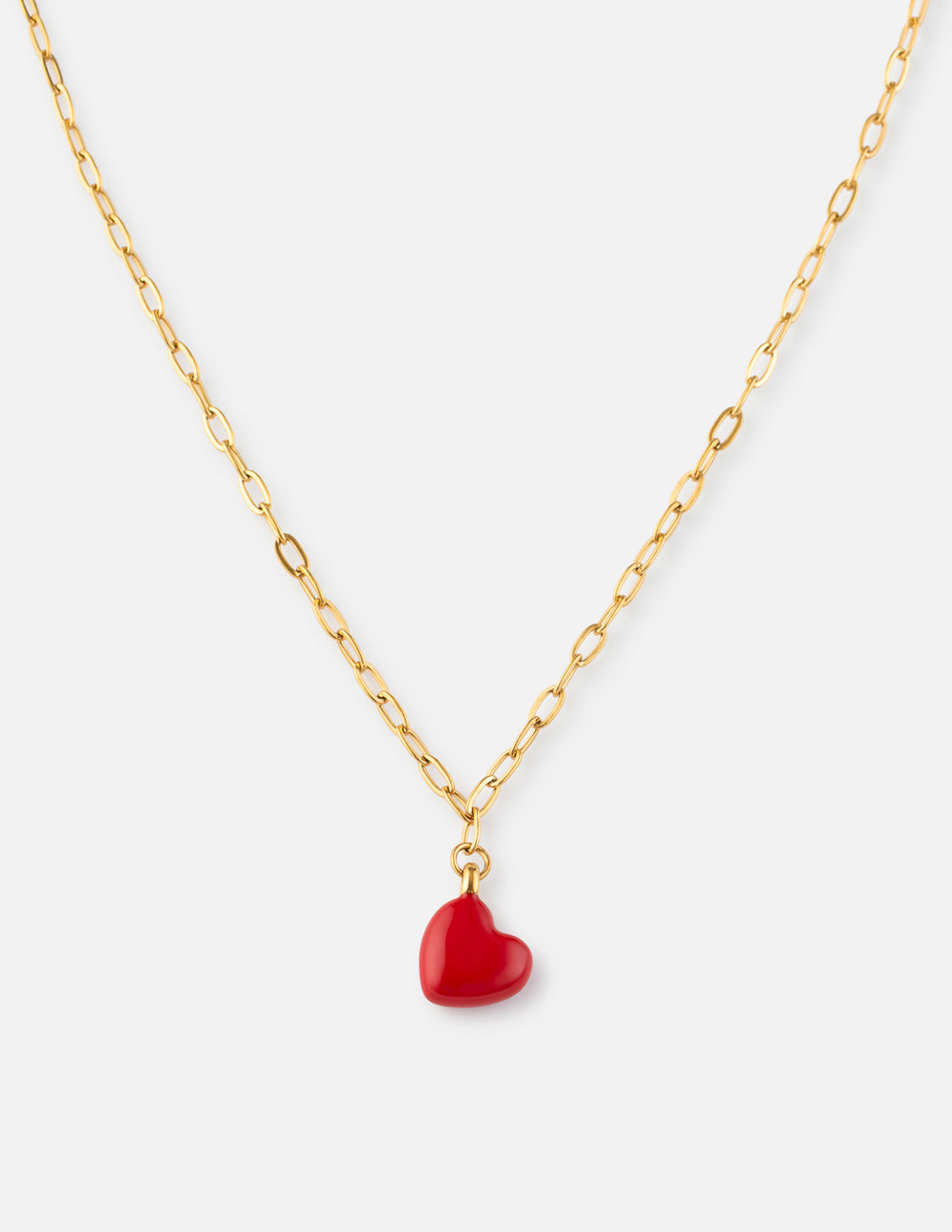 Gold paperclip chain necklace with red heart pendant
