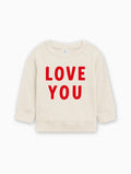 Baby toddler pullover in natural cream, “LOVE YOU” graphic in red on front