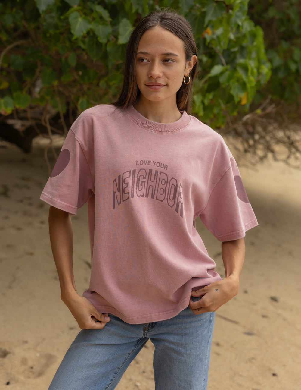 Pink heavyweight T-shirt with crew neck and 'Neighbor' front graphic logo