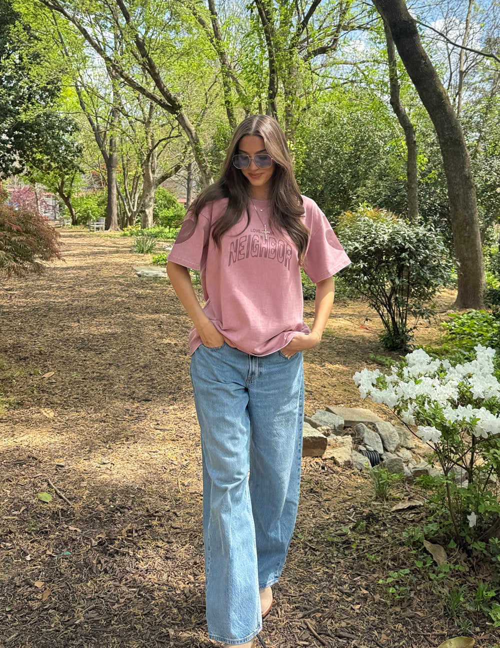 Pink heavyweight T-shirt with crew neck and 'Neighbor' front graphic logo