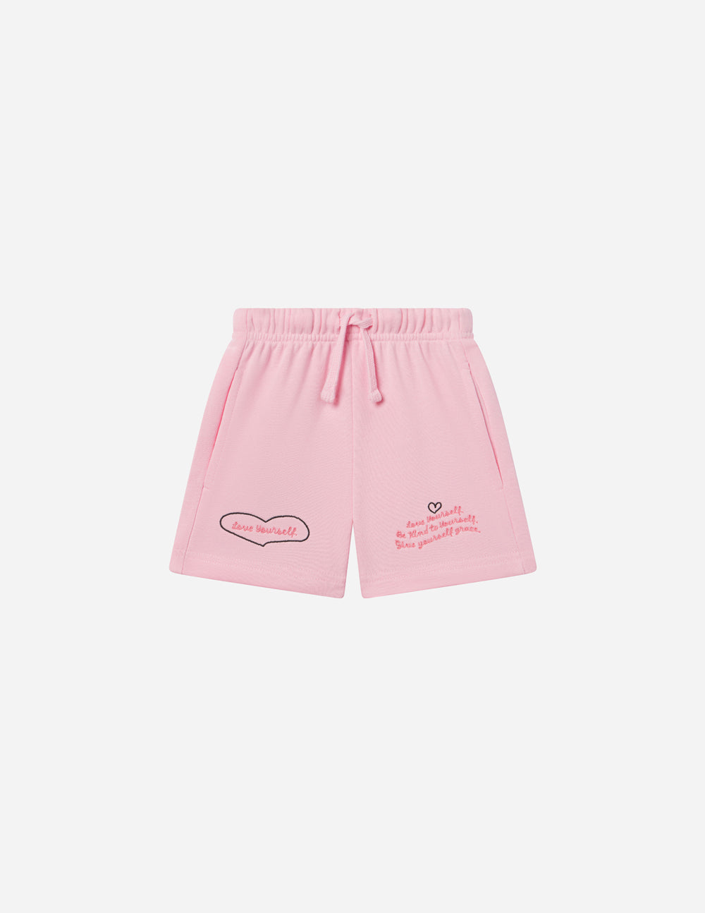 Kids pink drawstring shorts with heart logo and script detail, flat lay