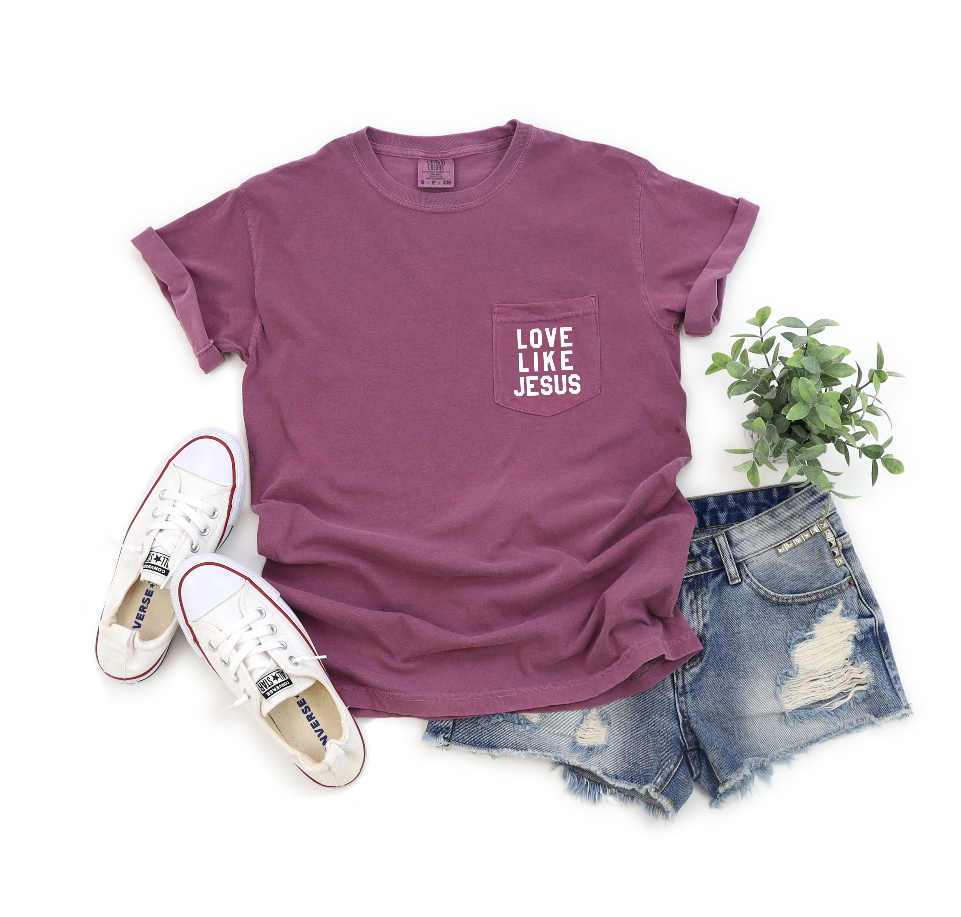 Short-sleeve pocket T-shirt, plum, with “LOVE LIKE JESUS” logo on chest pocket.