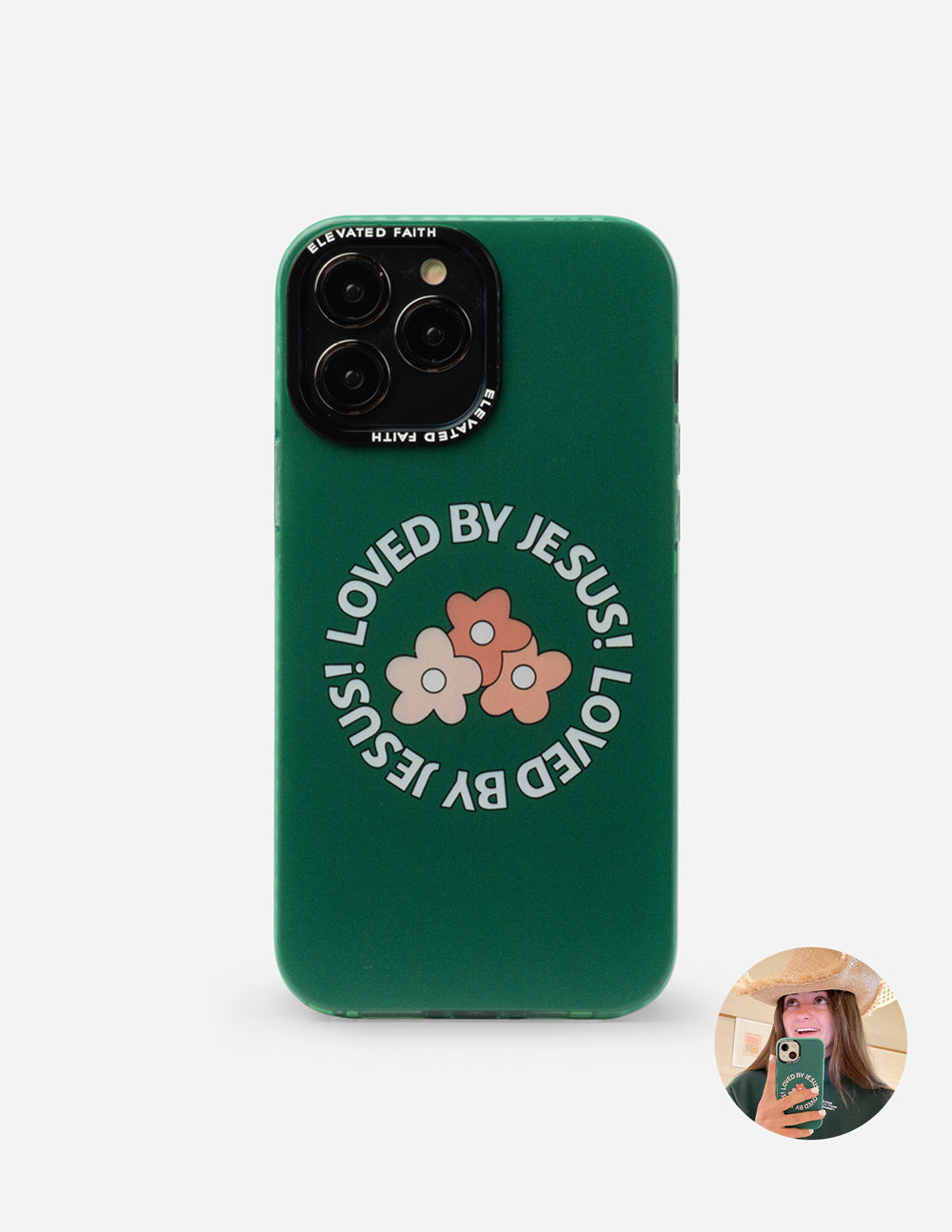 Green phone case back with floral print and 'LOVED BY JESUS' text, camera cutouts
