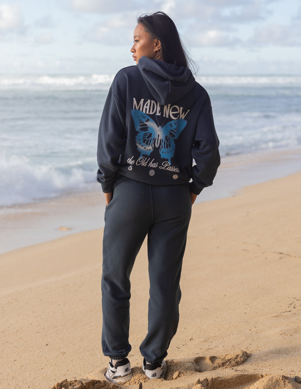 Unisex dark navy hoodie with butterfly back graphic, pullover hood and front pocket