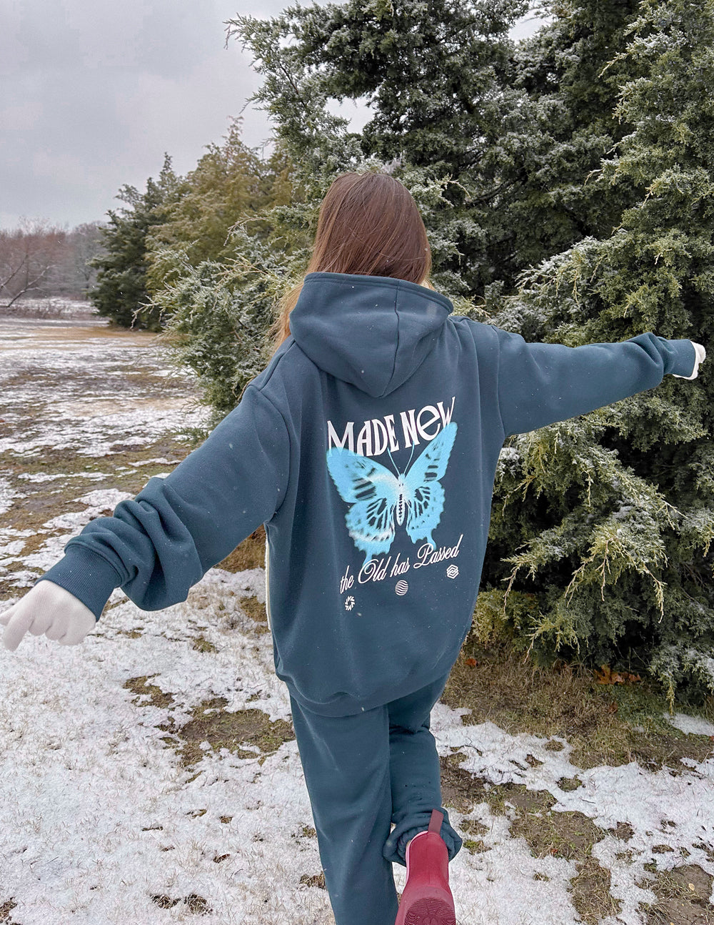 Unisex dark navy hoodie with butterfly back graphic, pullover hood and long sleeves