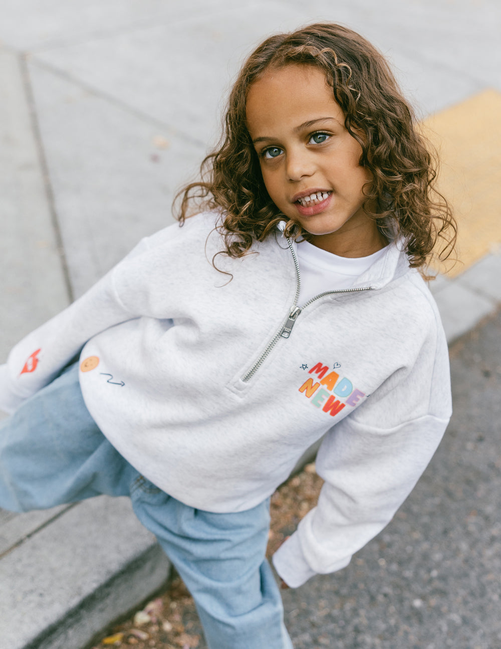 Kids gray half-zip sweatshirt with chest logo and front zipper