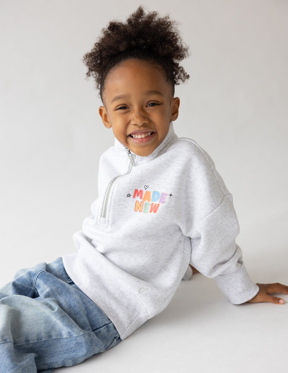 Kids gray half-zip sweatshirt with 'MADE NEW' logo and front zipper