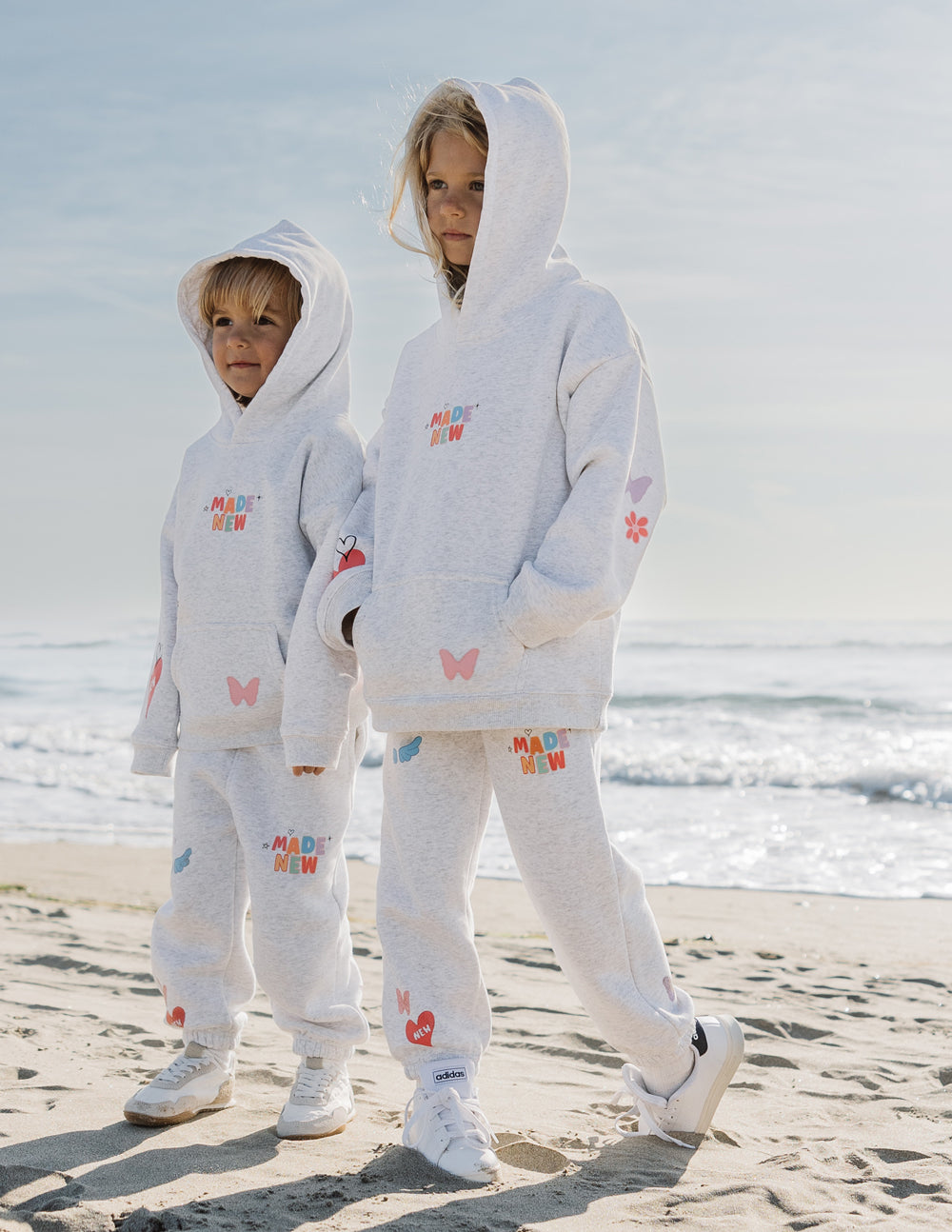 Kids light gray hooded outfit with Made New and butterfly prints
