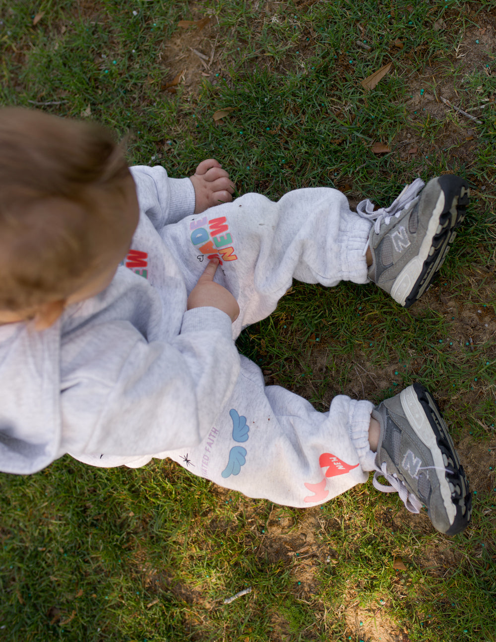 Kids gray sweatpants with playful whale graphic and multicolor logo prints
