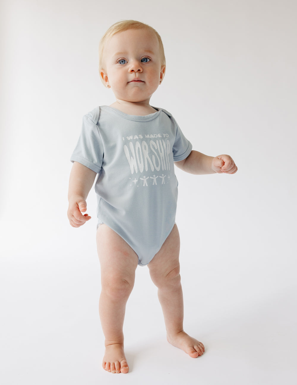 Light gray baby short-sleeve onesie with 'WORSHIP' front print