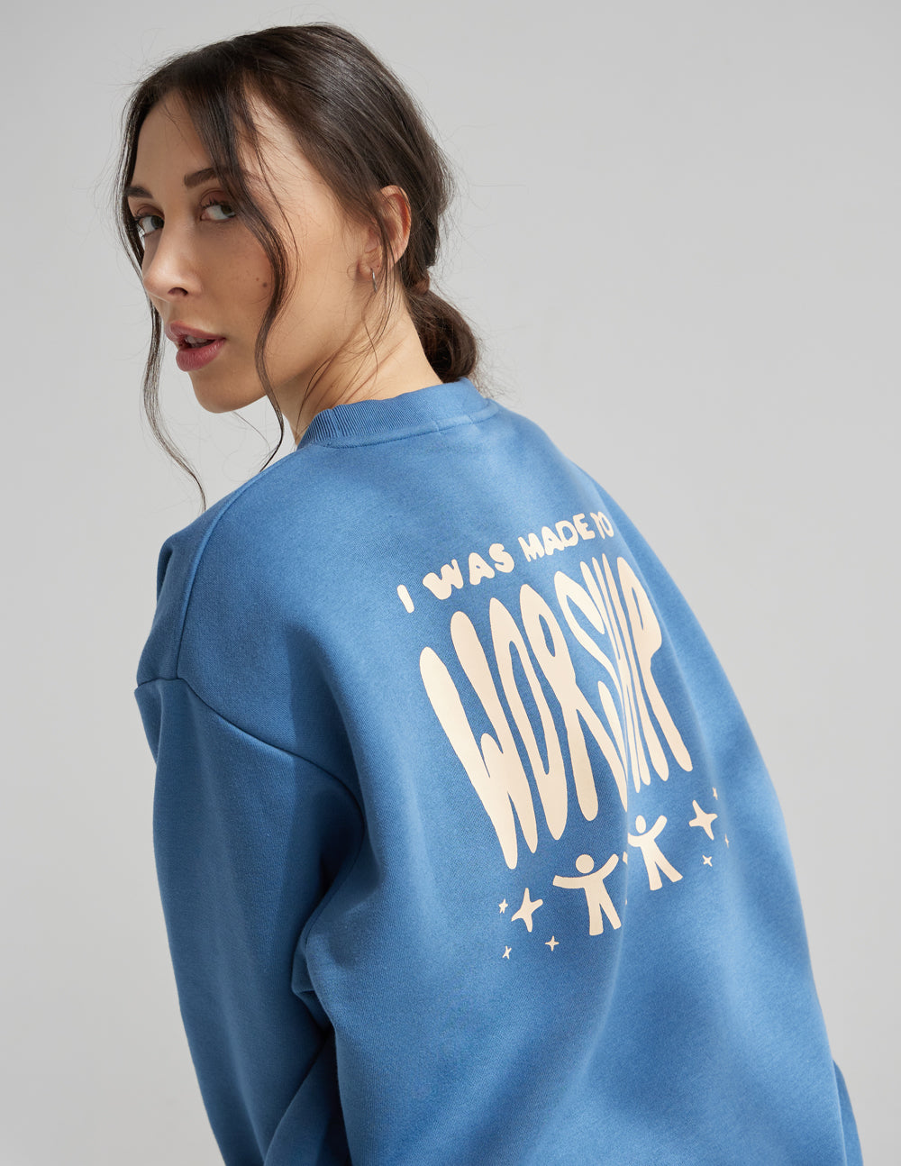 Blue unisex crewneck sweatshirt with large worship graphic on back