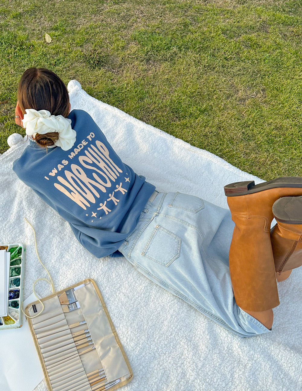 Blue unisex crewneck sweatshirt with worship back graphic
