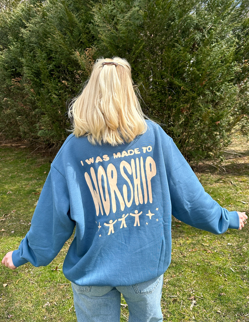 Blue unisex crewneck sweatshirt, back graphic text “I WAS MADE TO WORSHIP”