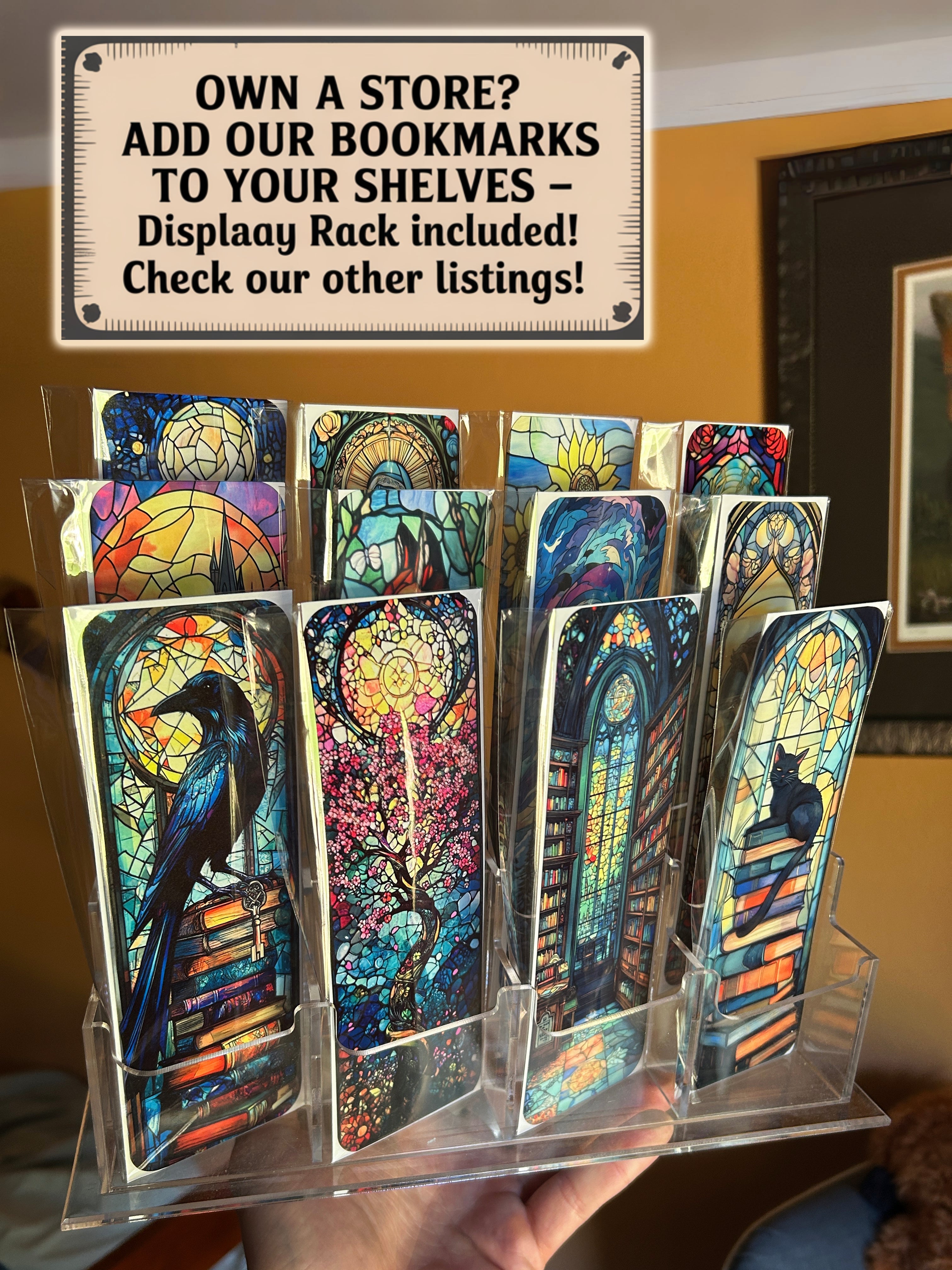Virgin Mary bookmark cards in clear stand display, colorful stained-glass artwork