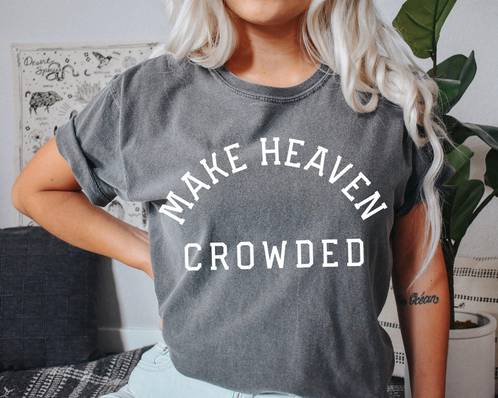 Dark gray T-shirt with “Make Heaven Crowded” graphic on front