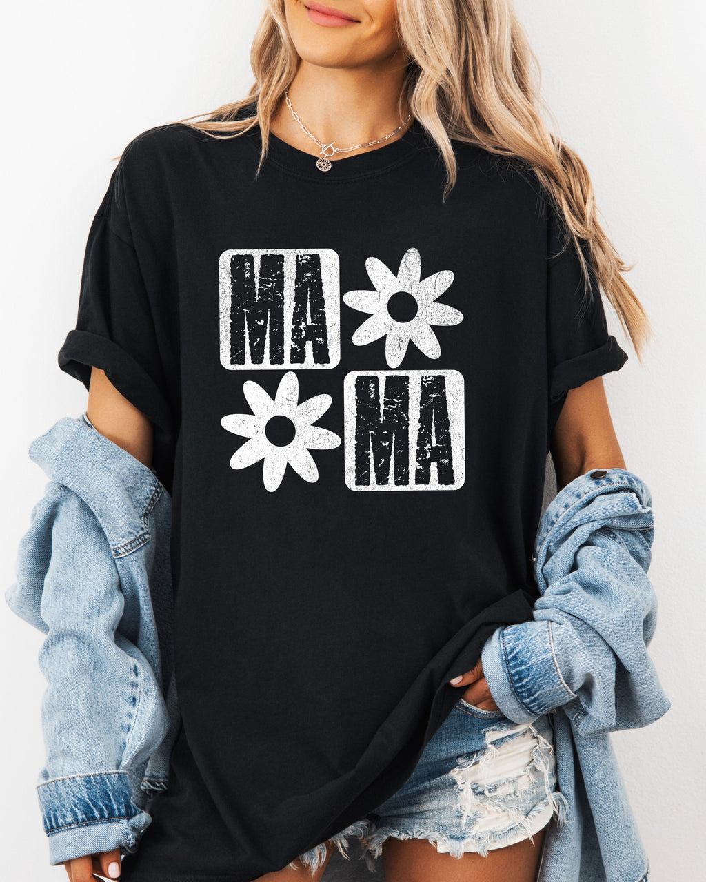 Black short-sleeve T-shirt with white "MA" and flower graphic front