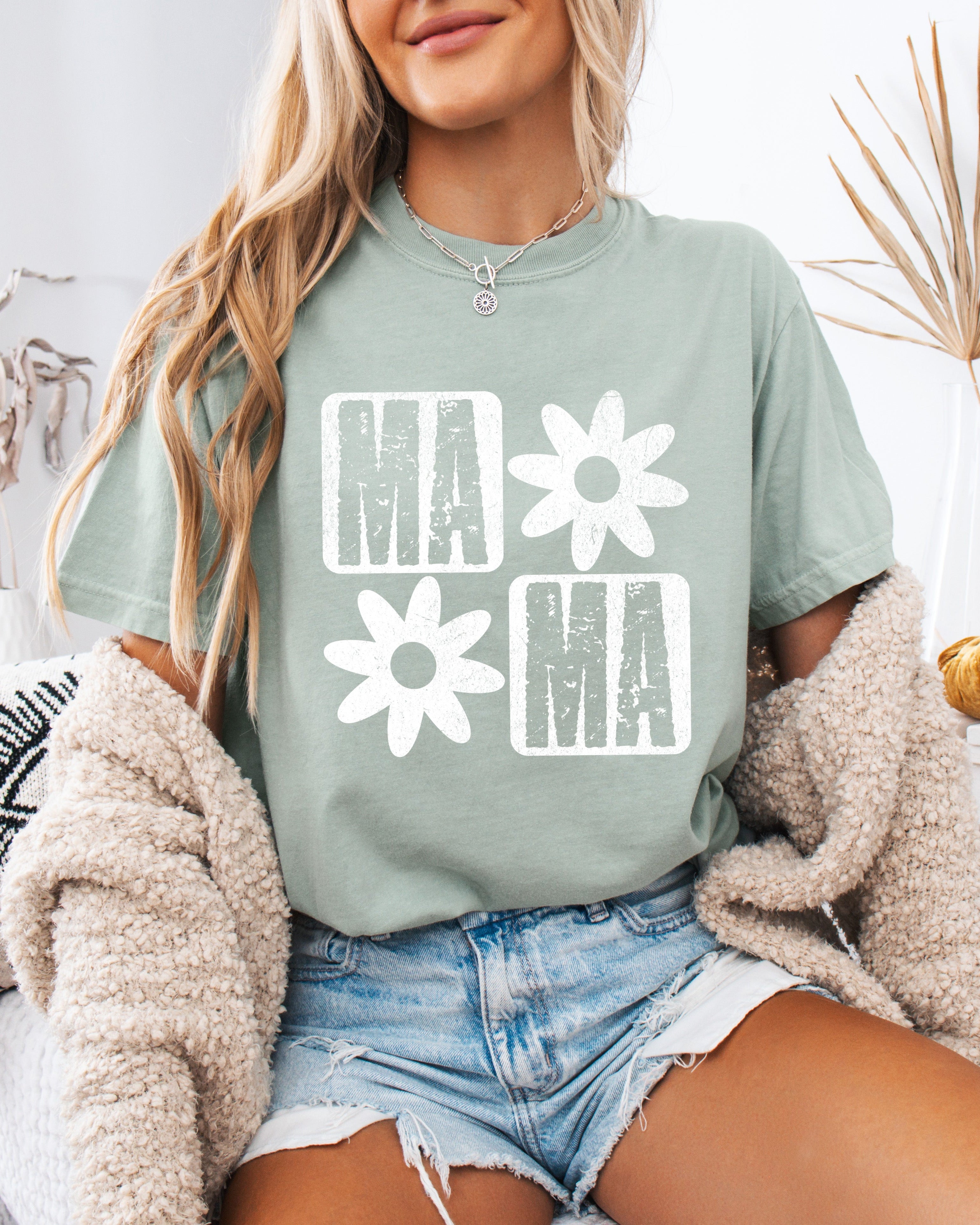 Sage green short-sleeve T-shirt with white "MA" and flower graphic